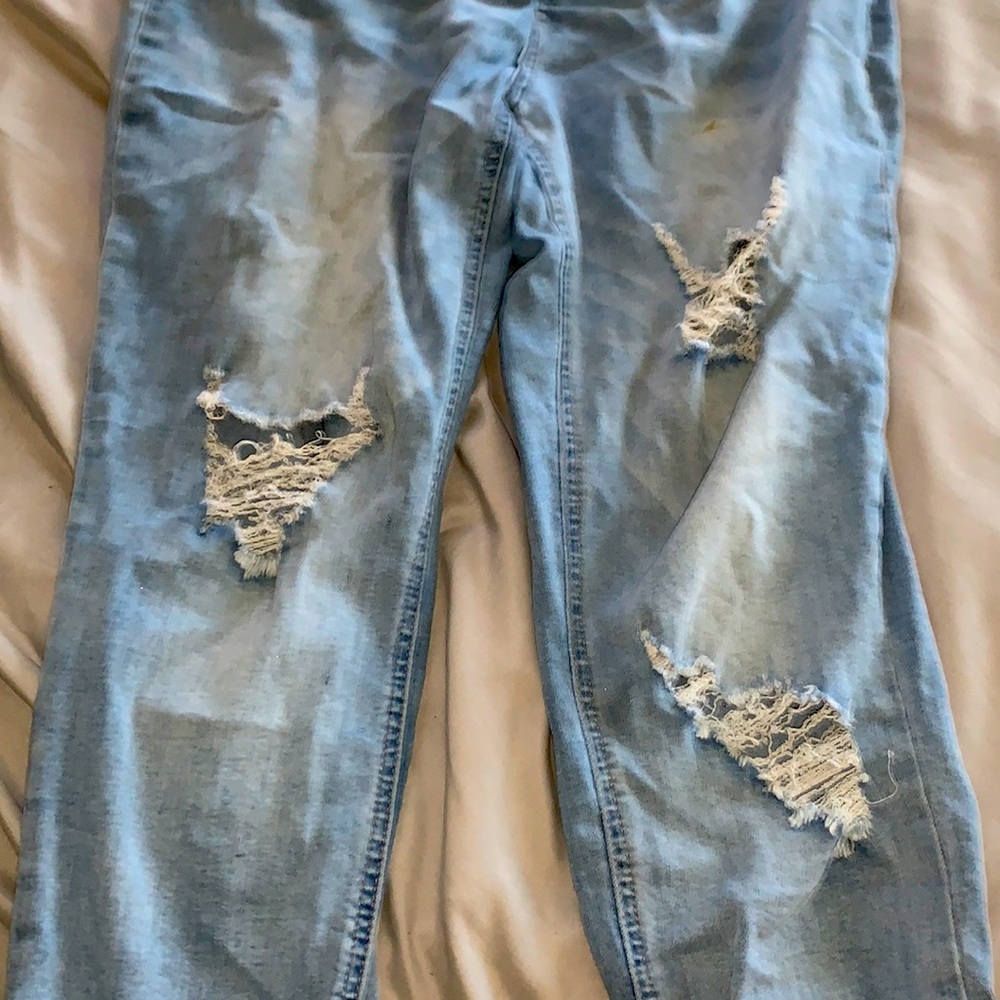 Cute jeans with holes in the knees